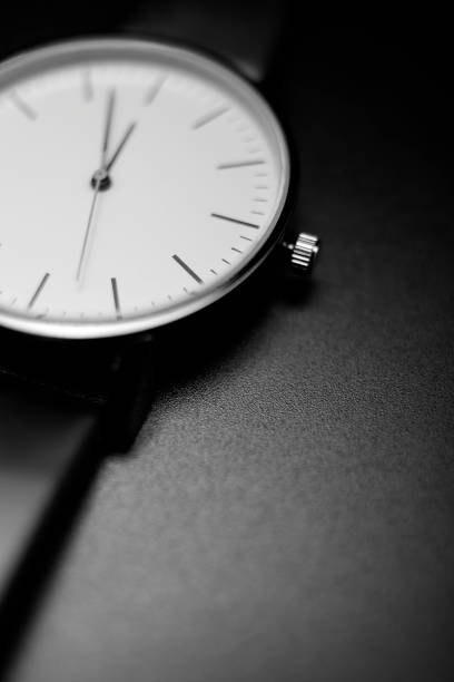 istock unbranded white analog wristwatch with black hands 1315125637