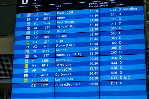 Departure board at Munich Airport, Munich, Bavaria, Germany, Europe\