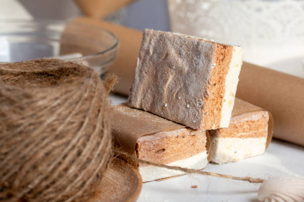 istock Portion marshmallow with cocoa and cranberries. Wrapped in paper and tied with string. Two-layer zephyr. 1315129679