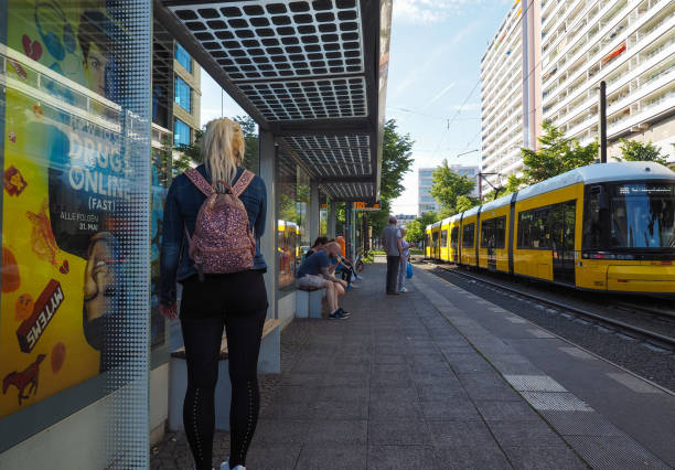 Berlin, Germany - Circa June 2019: travellers at tram station