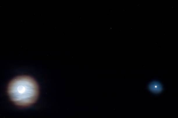 istock moon and venus on a night cloudy sky 1315135195