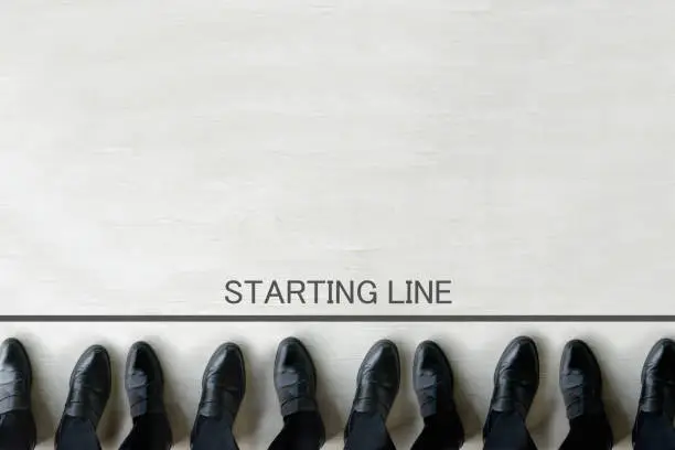 Business team standing by starting line