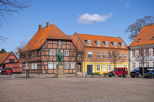 City square in Sorø with a statue of King Frederik VII (1808 to 1868) who was the first Danish king to sign a modern constitution in 1848. Sorø is a small town in the center of Zealand