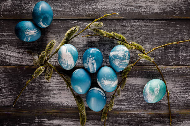 istock marble colored blue and white easter eggs on wooden background 1315140509