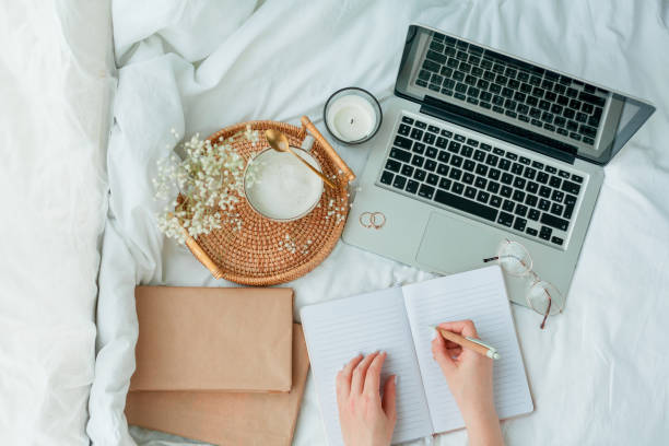 istock Home Office. Work. Laptop, coffee, flowers, spring, home decor. Cozy. 1315141183