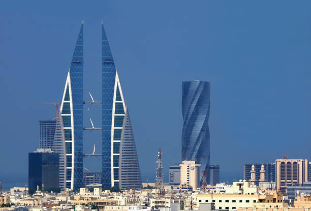 amazing manama skyline with the iconic bahrain world trade center or bwtc building and the united tower, manama city, bahrain - middle eastern architecture imagens e fotografias de stock