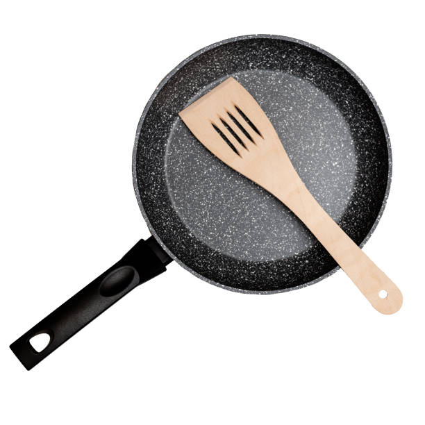 istock Frying pan with non-stick ceramic coating and spatula isolated on white background. 1315141573