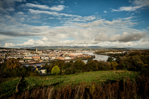 A view of the city of Derry/Londonderry over the River Foyle on a sunny day.