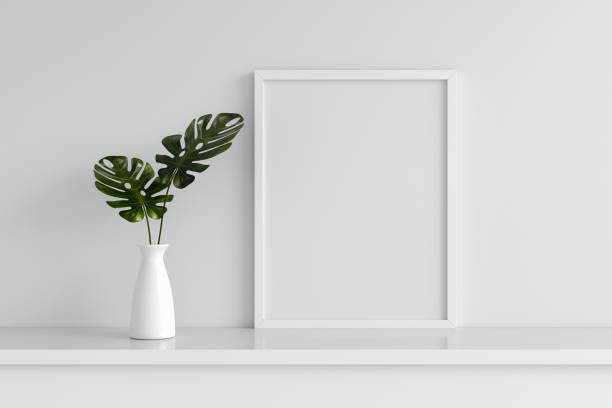 istock Monstera plant in vase with frame mockup, 3D rendering 1315143597