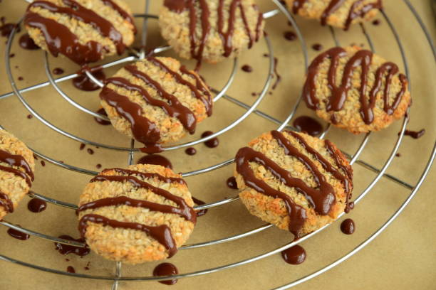istock Banana coconut cookies drizzled with melted chocolate on cooling rack 1315146534