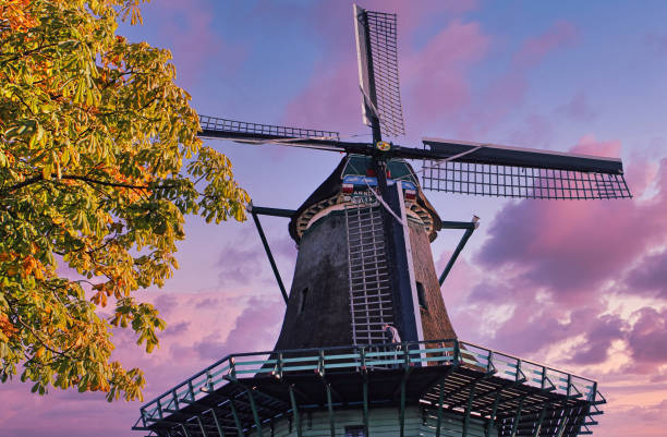 istock Large windmill seen from below during a beautiful purple sunset. 1315155070