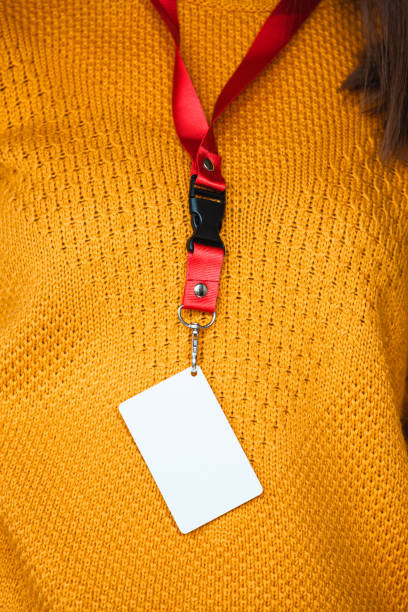 istock Woman holding badge name tag, with blank space mock up 1315155135