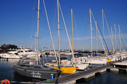 Oeiras, Lisbon district, Portugal: Oeiras marina, on the estuary of the river Tagus on the Atlantic Ocean, between Cascais and Lisbon, Cisco Systems boat in the foreground.