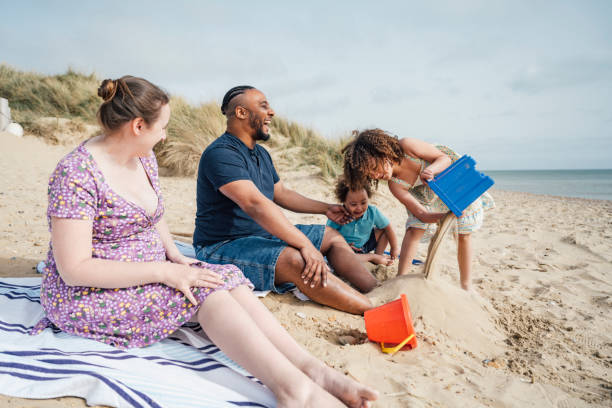 istock Multi-ethnic British family on vacation at Camber Sands 1315157608