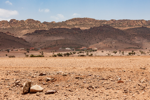deserted landscape in Morocco with mountains of Anti-Atlas in the background