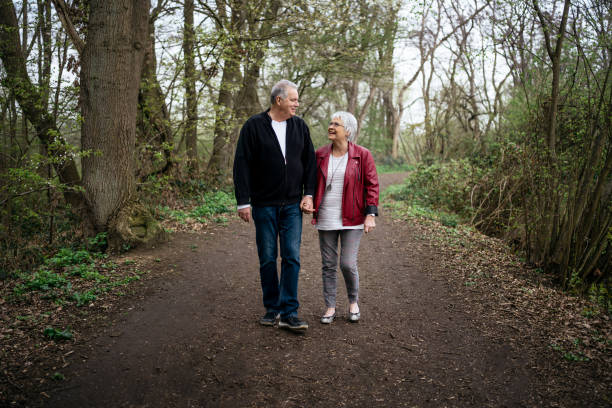 istock Elderly couple taking a walk in nature 1315159750