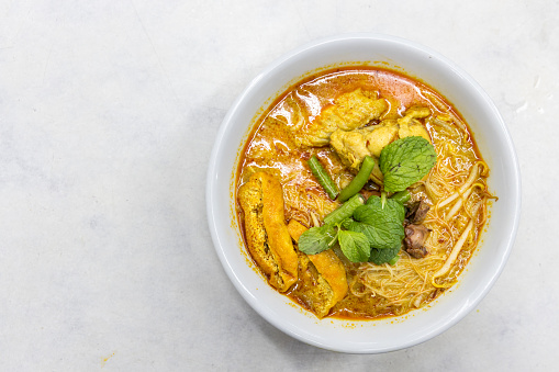 Overhead view of simple and delicious curry mee or noodle, one of the popular cuisine in Malaysia