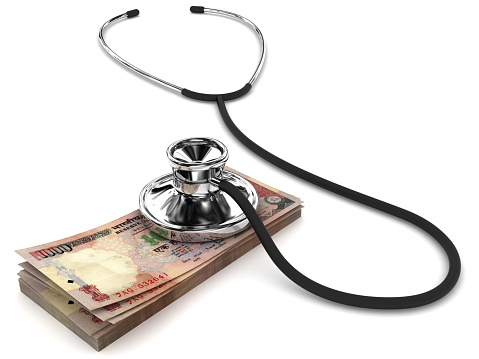 Indian rupee money insurance crisis stethoscope