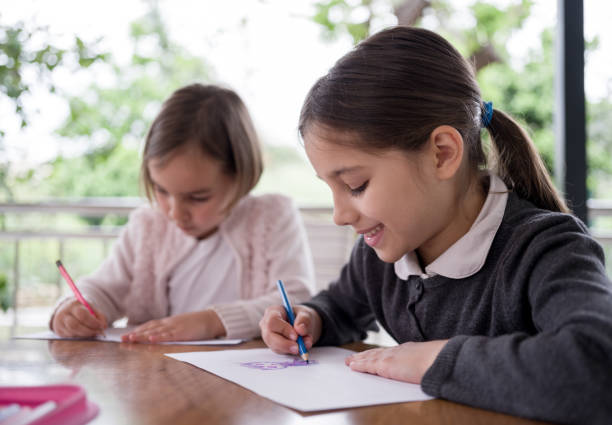 istock Child Sisters Painting Picture 1315171514