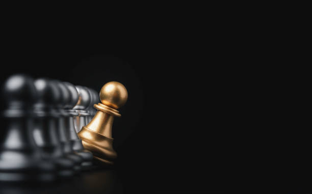 istock Golden pawn chess move out from line for different thinking and leading change , Disruption and unique concept. 1315173284