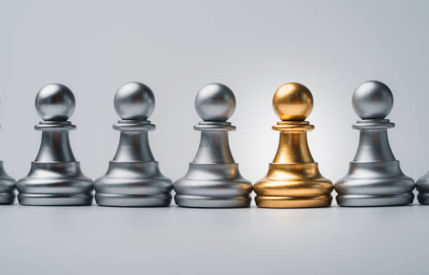 istock Golden pawn chess among silver for different thinking idea and disruption concept. 1315173907