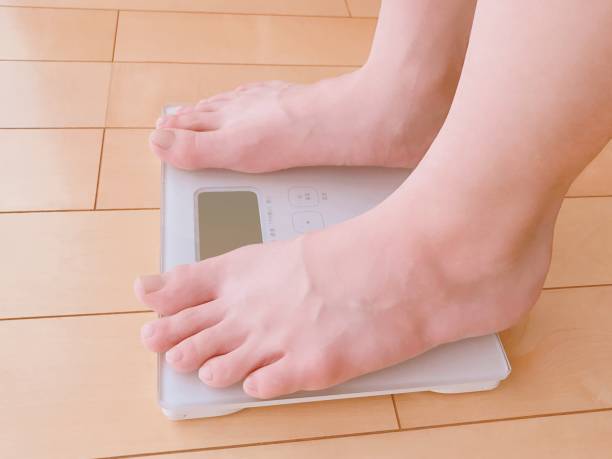 istock Person who weighs 1315174744