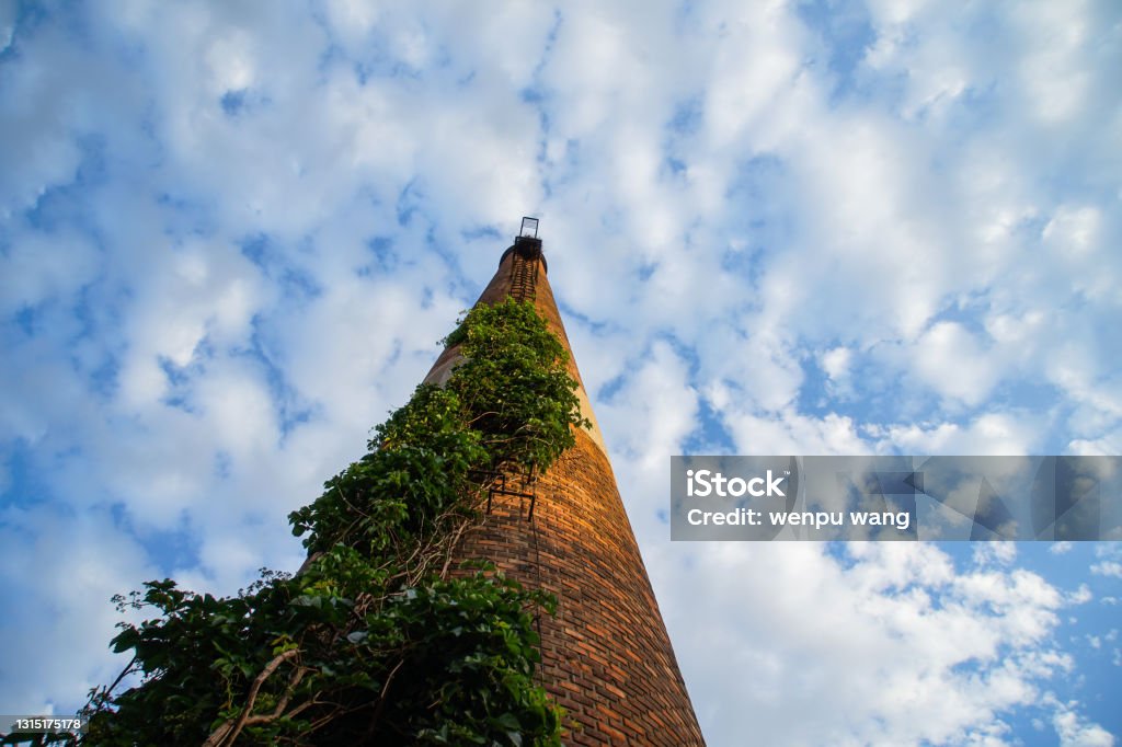 Red brick chimney creeper Architecture Stock Photo