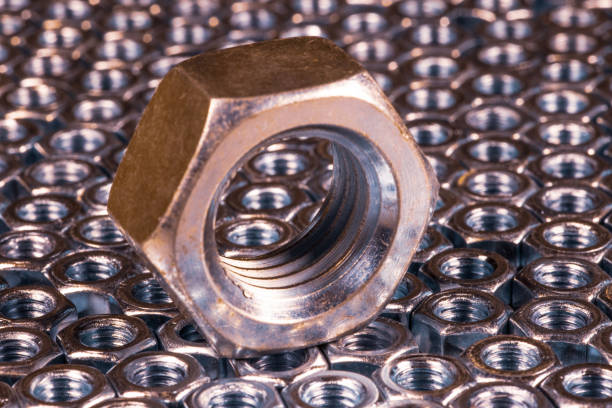 Close-up metal chrome one big nut. Background concept for fasteners and construction topics. Repair and spare parts concept