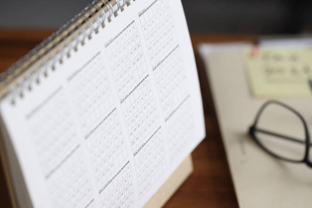 istock Calendar for year and glasses on desktop 1315178887