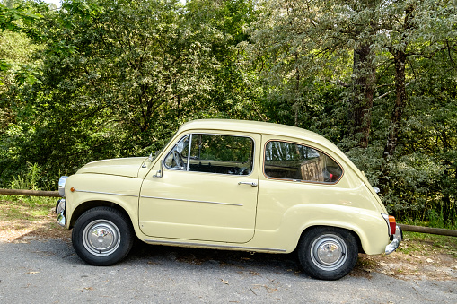 Galicia, June 24, 2020. A very well-kept Seat 600 in the parking lot of a recreational area. The Seat 600 was one of the first cars accessible to the general public in Spain in the 60s.