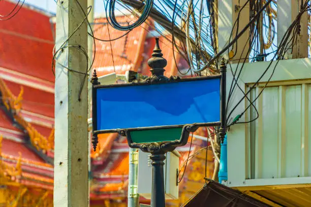 Photo of Blank empty blue typical Asian street road sign Bangkok Thailand.