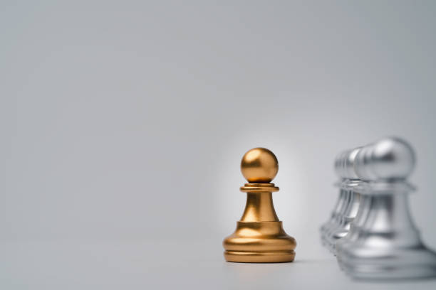 istock Golden pawn chess move out from line for different thinking and leading change , Disruption and unique concept. 1315188705