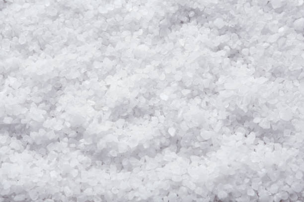 istock Natural sea salt as background, top view 1315194960