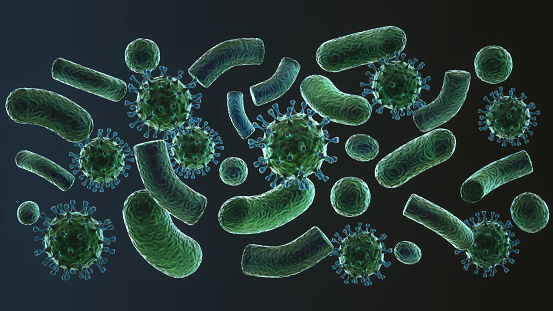 Stylized representation of monochrome green glowing virus cells on a dark background