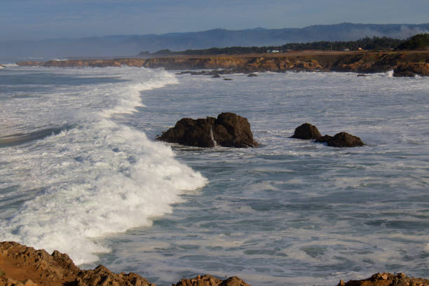 istock landscape view of waves crashing on shoreline 1315199309