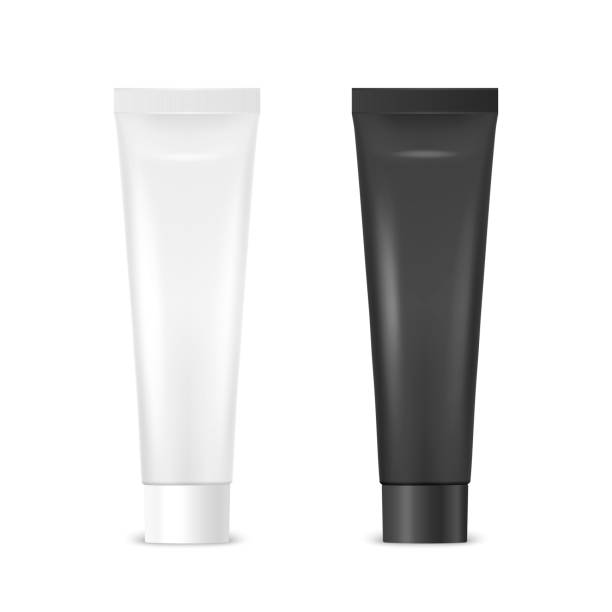 istock Vector 3d Realistic Plastic, Metal White and Black Tooth Paste, Cream Tube Packing Isolated on White Background. Design Template of Toothpaste, Cosmetics, Cream, Tooth Paste for Mockup. Front View 1315199327