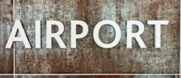 istock Raised AIRPORT sign on a textured distressed background 1315200634