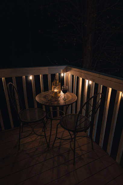 istock A Glass Of Red Wine On The Table At Night 1315201022