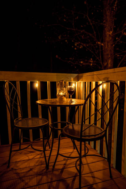 istock A Glass Of Red Wine On The Table At Night 1315201045