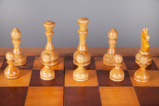 istock White pieces on chess board. Wooden chess. 1315201544