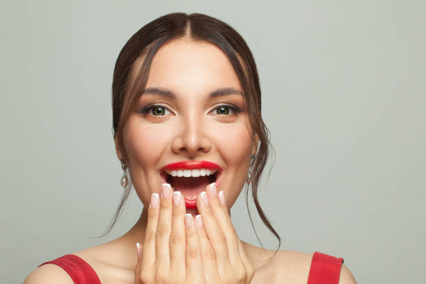 istock Pretty surprised woman on white background. Positive emotion 1315204345