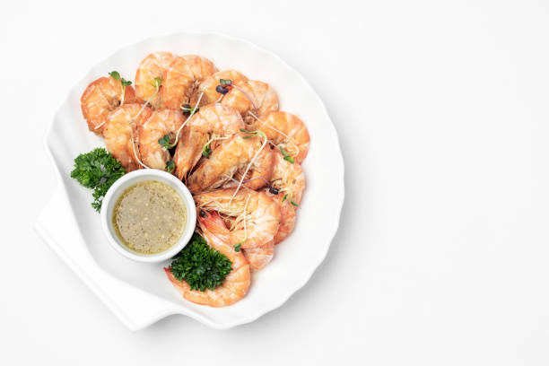 istock fresh boiled prawns with zesty citrus dipping sauce on white background 1315213049