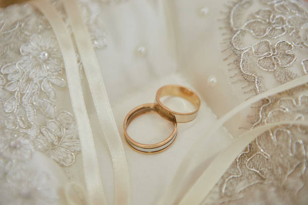 istock beautiful wedding rings lie on the bride's veil 1315219502
