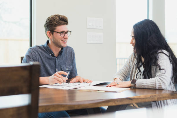 istock Mature woman meets with financial advisor 1315220449