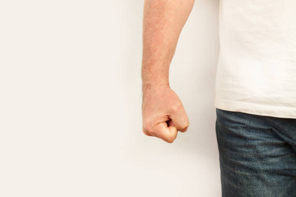 istock Man with his fist clenched on a white background 1315221866