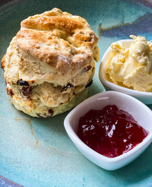 istock Homemade fruit scone with clotted cream and jam 1315223281
