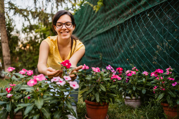 istock Woman nurture her garden 1315223533