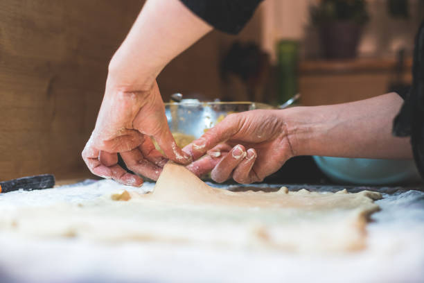 istock Rolling traditional dough in the kitchen, close up 1315224314