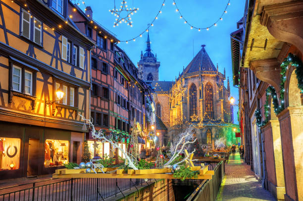 Colmar city, Alsace, France, illuminated for Christmas Festive Christmas illumination in the historical Old town of Colmar, Alsace, France colmar stock pictures, royalty-free photos & images
