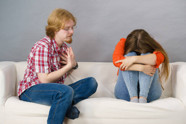 istock Woman and man after argue on sofa 1315226253